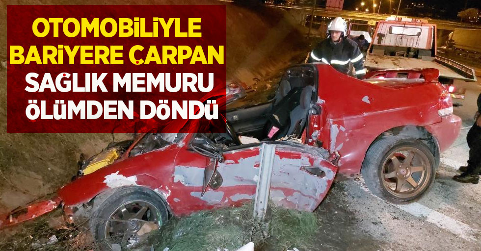 Otomobiliyle bariyere çarpan sağlık memuru ölümden döndü