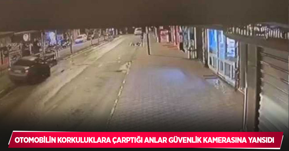 Otomobilin korkuluklara çarptığı anlar güvenlik kamerasına yansıdı