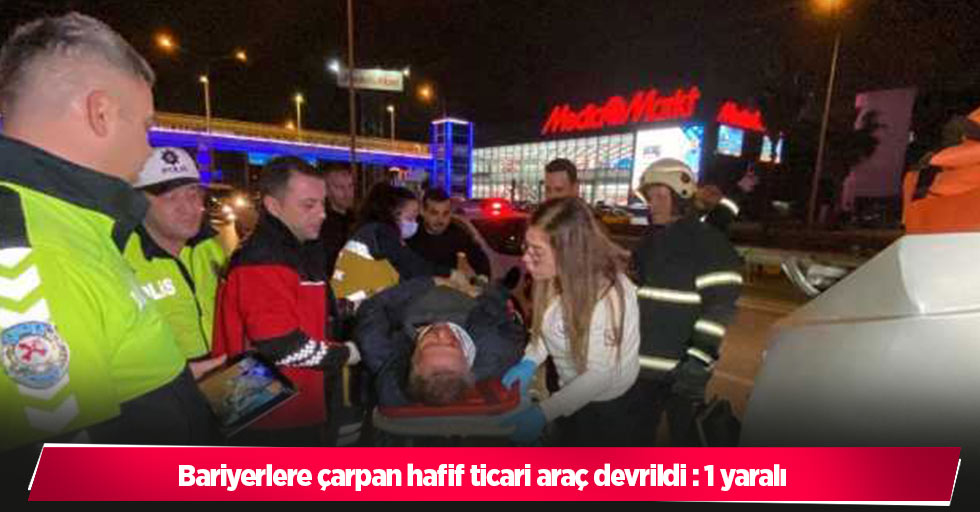 Bariyerlere çarpan hafif ticari araç devrildi : 1 yaralı