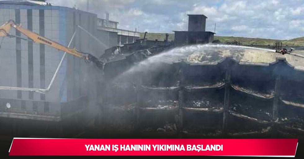 Yanan iş hanının yıkımına başlandı