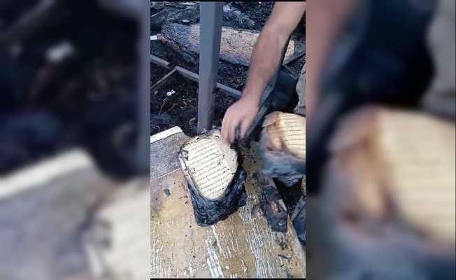 3 konteyner küle dönerken Kur’an-ı Kerim’in sayfaları yanmadı