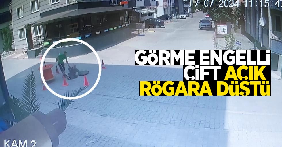 Görme engelli çift açık rögara düştü