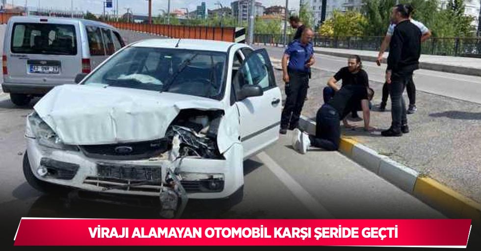 Virajı alamayan otomobil karşı şeride geçti