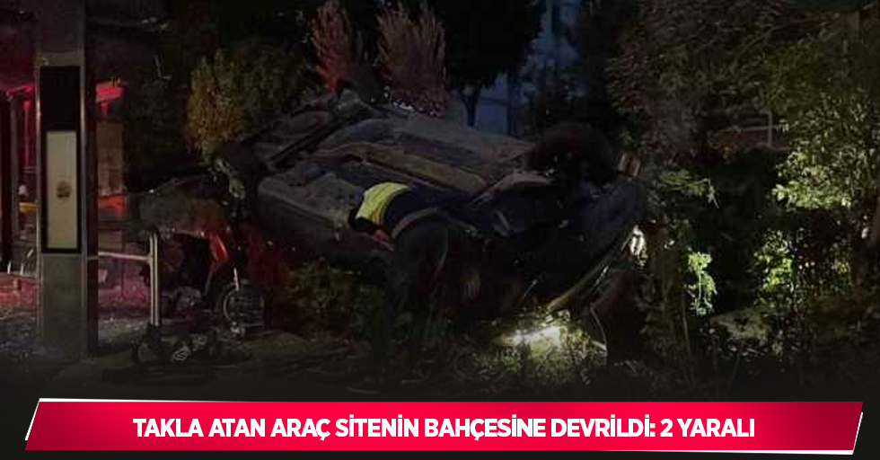 Takla atan araç sitenin bahçesine devrildi: 2 yaralı