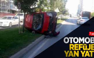 Otomobil refüje yan yattı: 1 yaralı