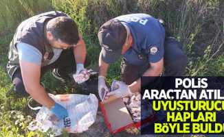 Polis araçtan atılan uyuşturucu hapları böyle buldu