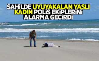 Sahilde uyuyakalan yaşlı kadın, polisi alarma geçirdi