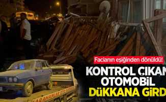 Kontrolden çıkan otomobil dükkana girdi