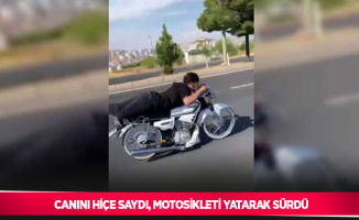 Canını hiçe saydı, motosikleti yatarak sürdü