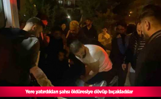 Yere yatırdıkları şahsı öldüresiye dövüp bıçakladılar