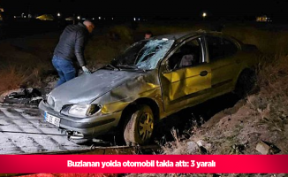 Buzlanan yolda otomobil takla attı: 3 yaralı