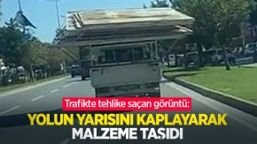 Trafikte tehlike saçan görüntü: Yolun yarısını kaplayarak malzeme taşıdı