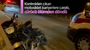 Kontrolden çıkan motosiklet bariyerlere çarptı, sürücü ölümden döndü